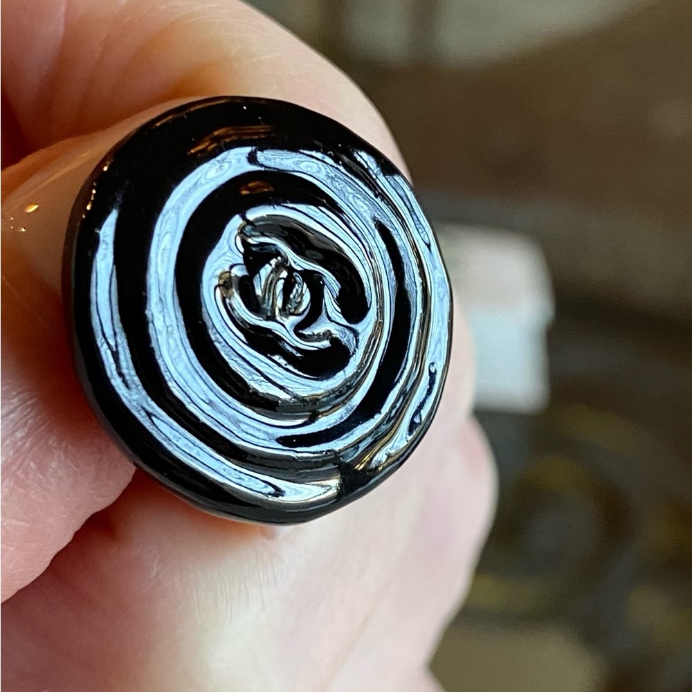 Chanel black buttons